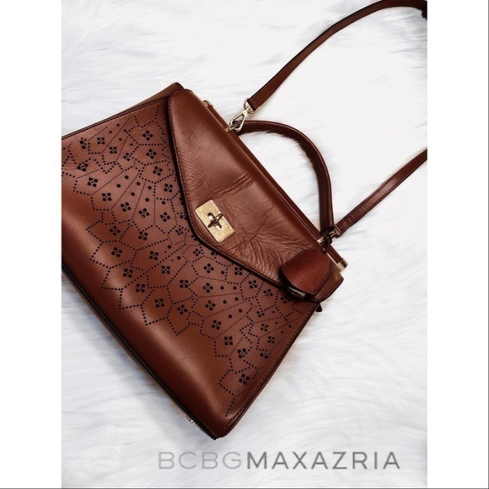 BCBGMaxAzria laser cut trapeze handbag
